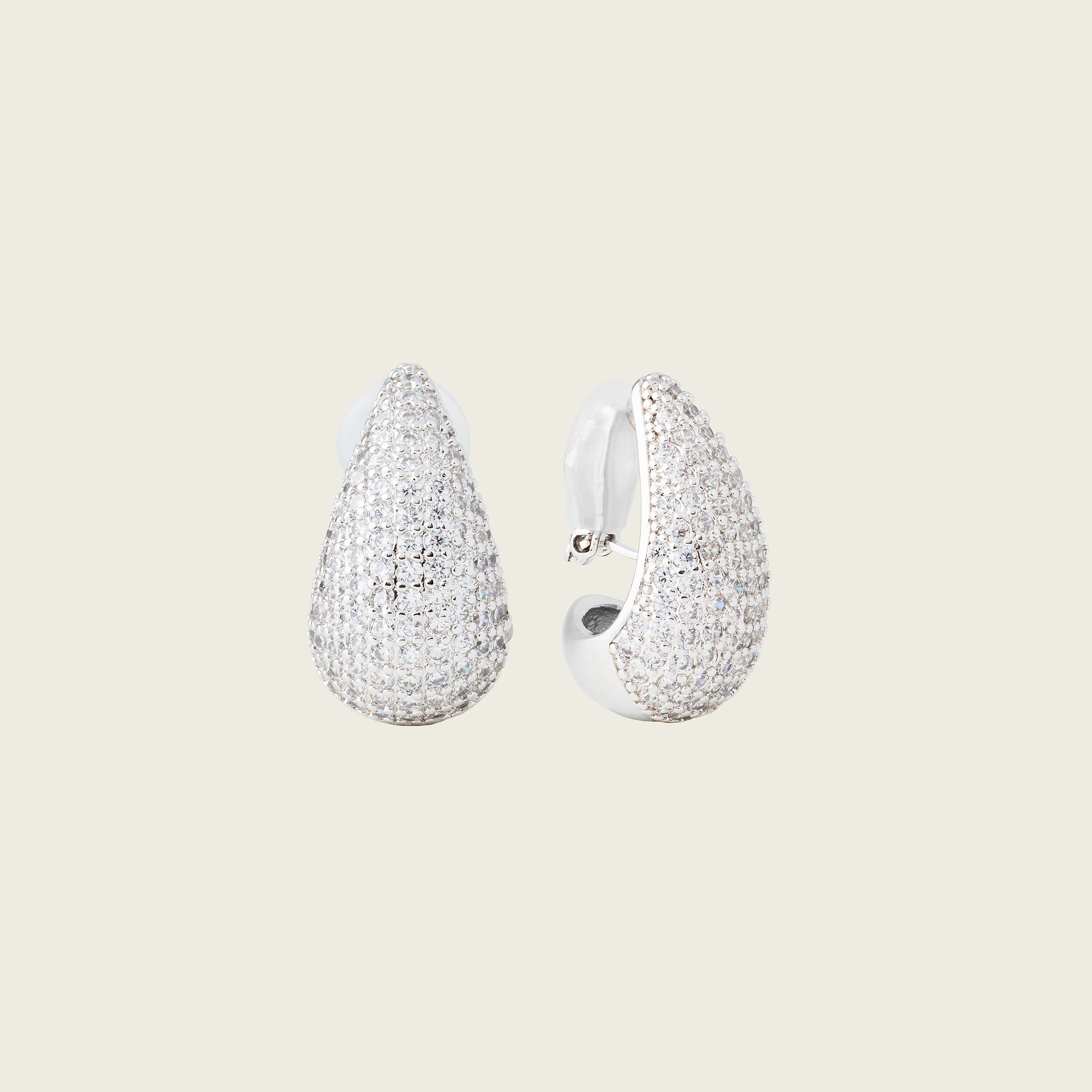 https://cdn.shopify.com/s/files/1/0569/3286/0096/files/AIORI_LilaPave_ClipOnEarring_Silver_1.jpg?v=1770215205