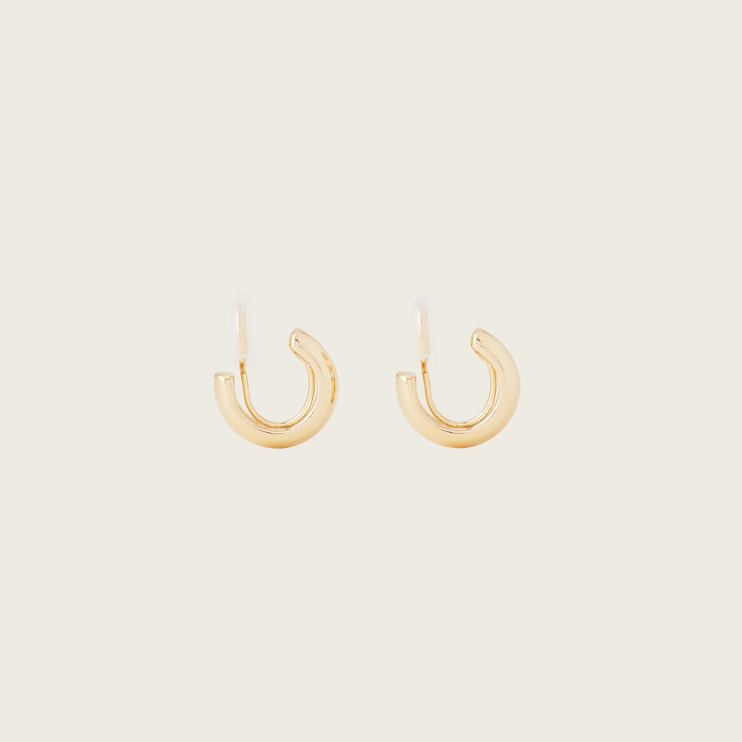 https://cdn.shopify.com/s/files/1/0569/3286/0096/files/AIORI_SimpleHuggie_Gold0_1_be934a45-e321-45d3-bf21-db81ba1b50ed.jpg?v=1762364090