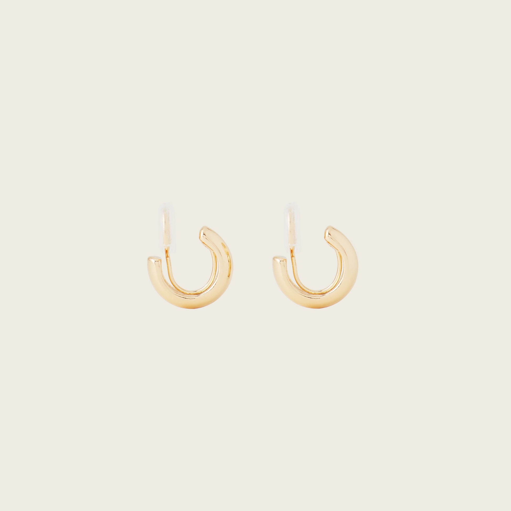 https://cdn.shopify.com/s/files/1/0569/3286/0096/files/AIORI_SimpleHuggie_Gold0_1_be934a45-e321-45d3-bf21-db81ba1b50ed.jpg?v=1762364090