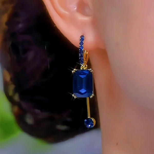 Boucles d’oreilles pendantes Saphir Élégance